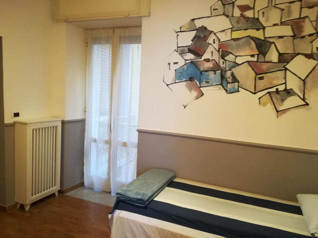 Posteľ alebo postele v izbe v ubytovaní I Tetti Napoli