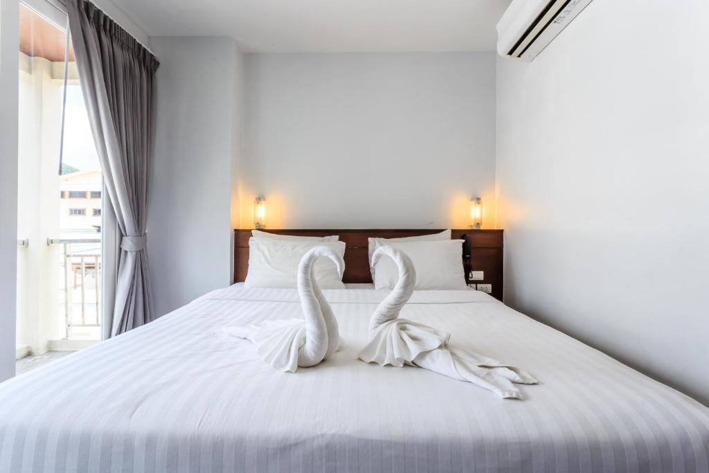 Postel nebo postele na pokoji v ubytování 77 Bangla Hotel - SHA Certified