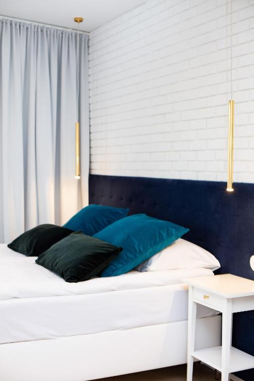 Posteľ alebo postele v izbe v ubytovaní Apartments Warsaw CityLink by Noclegi Renters