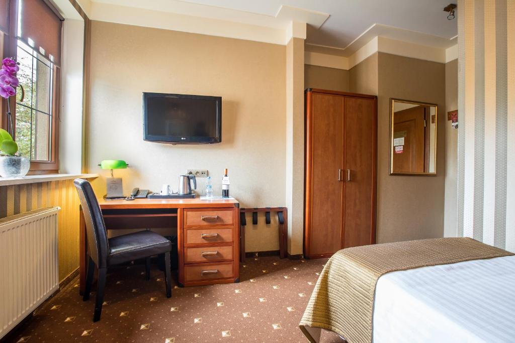 Postel nebo postele na pokoji v ubytování Hotel Diament Bella Notte Katowice - Chorzów