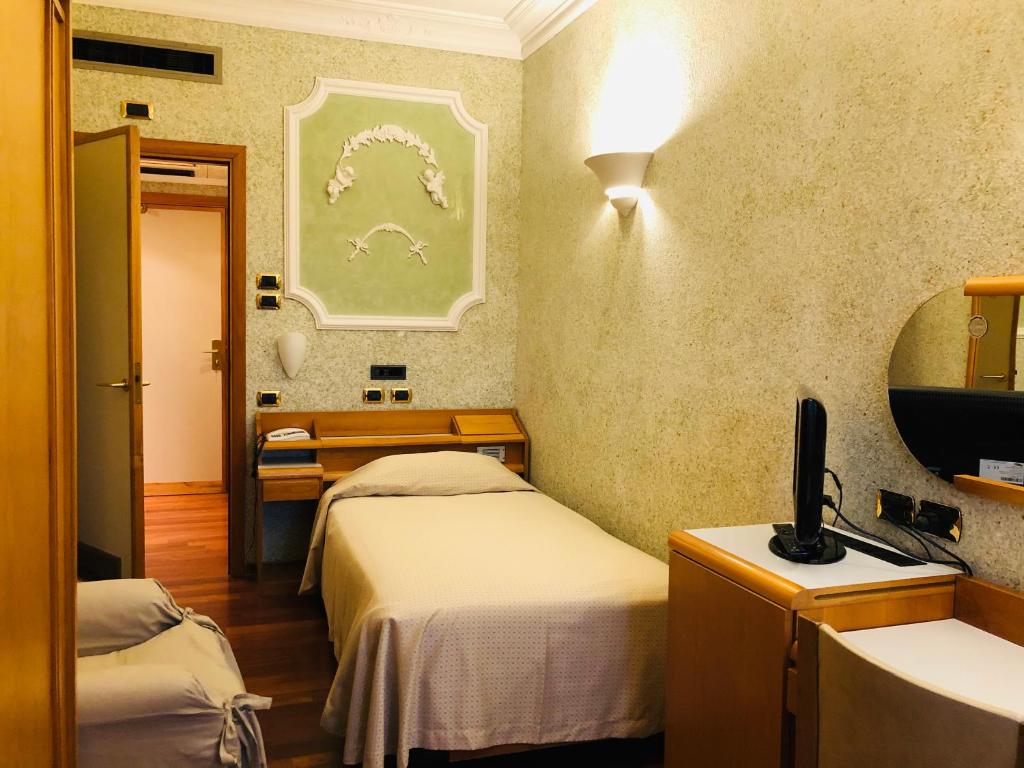 TV a/nebo společenská místnost v ubytování Grand Hotel Ambasciatori Wellness & Spa
