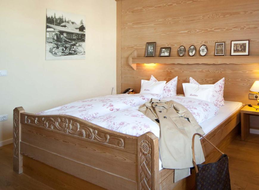 Postel nebo postele na pokoji v ubytování Gasthof-Hotel Dannerwirt