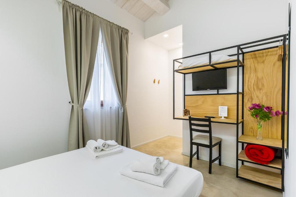 Katil atau katil-katil dalam bilik di Scicli Albergo Diffuso