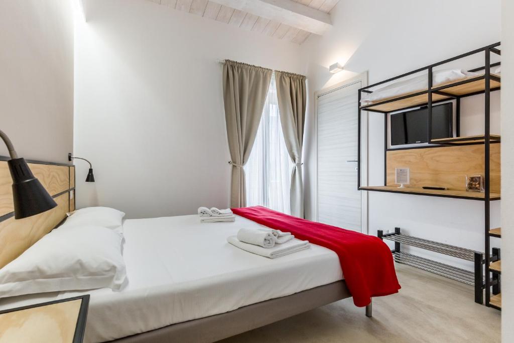 Katil atau katil-katil dalam bilik di Scicli Albergo Diffuso
