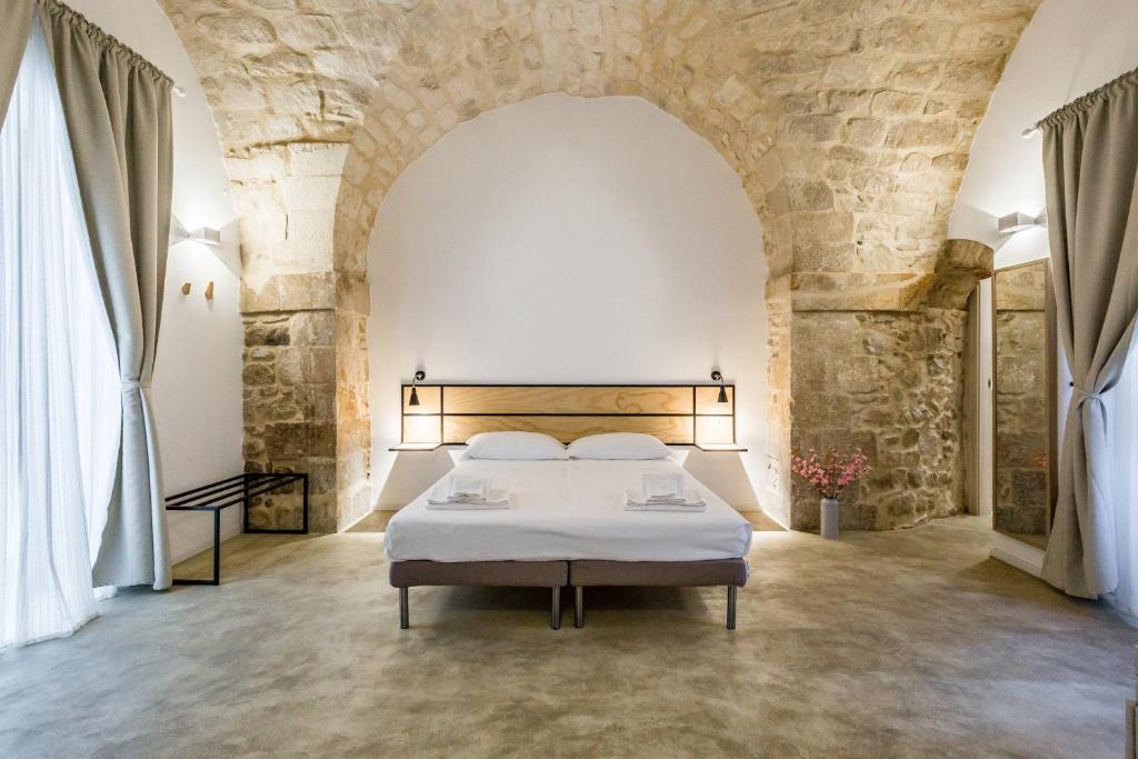 Katil atau katil-katil dalam bilik di Scicli Albergo Diffuso