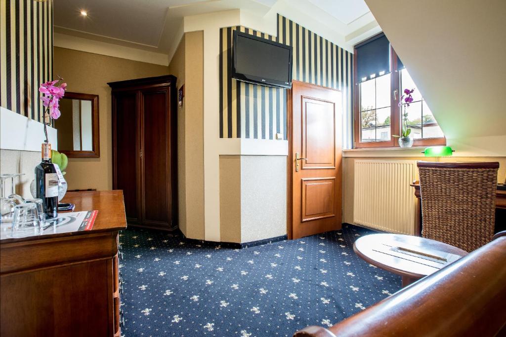 TV a/nebo společenská místnost v ubytování Hotel Diament Bella Notte Katowice - Chorzów