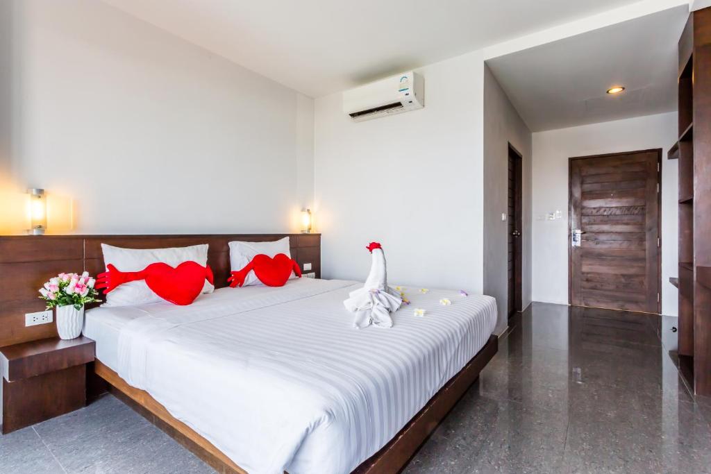 Postel nebo postele na pokoji v ubytování 77 Bangla Hotel - SHA Certified