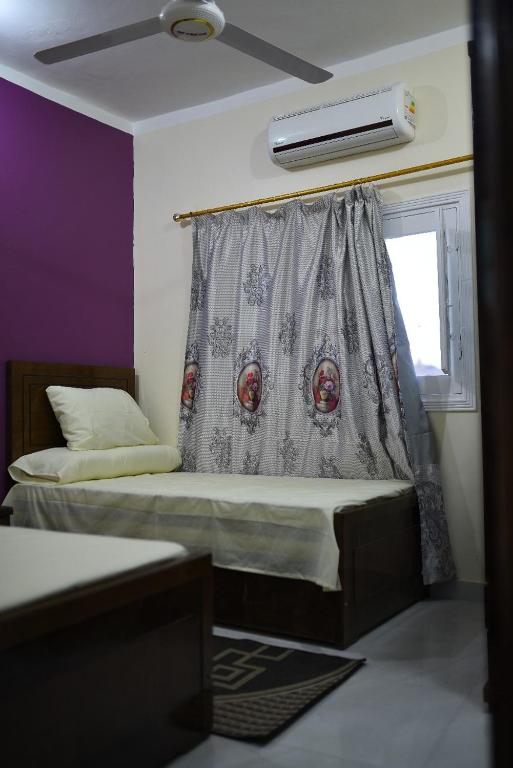 Postel nebo postele na pokoji v ubytování Kosh royal house