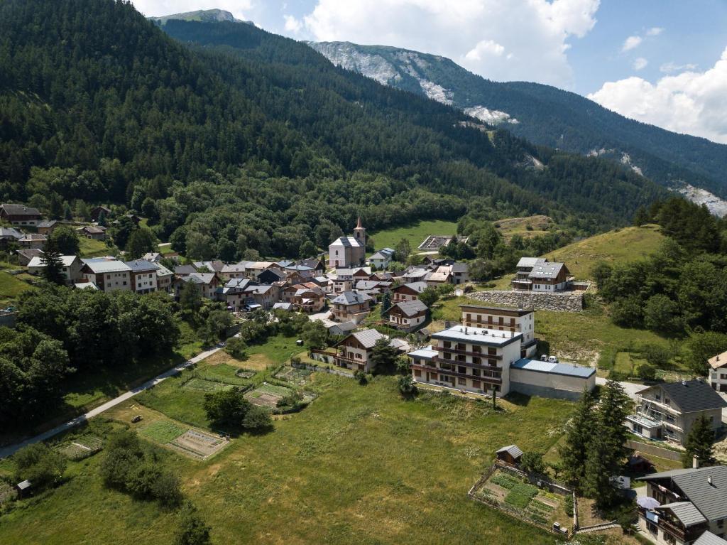 an aerial view of a small town in the mountains at Les Sorbiers in Montricher-le-Bochet