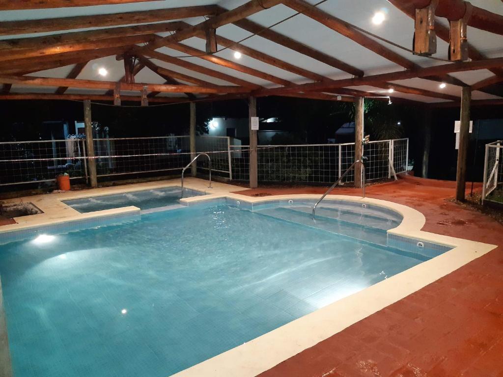 The swimming pool at or close to Hotel y Cabañas Dakota