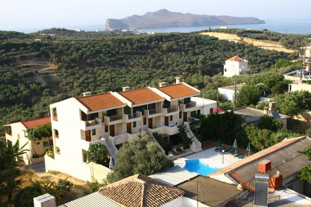 an aerial view of a villa with a resort at Orestis Hotel Sea View Apartments in Stalos