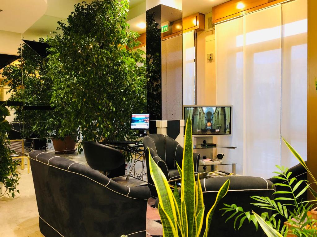 TV a/nebo společenská místnost v ubytování Grand Hotel Ambasciatori Wellness & Spa