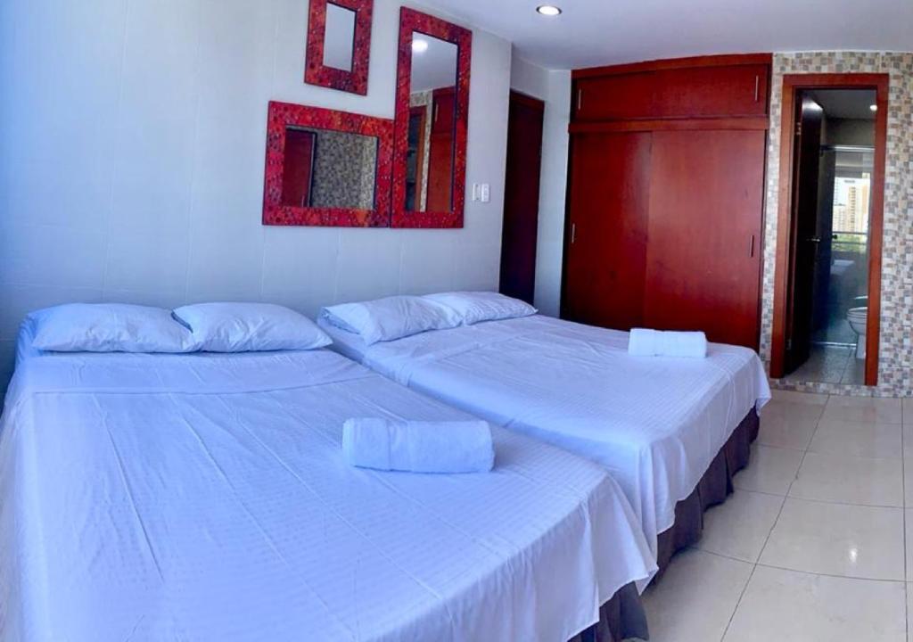Postel nebo postele na pokoji v ubytování PyEnsa Cartagena