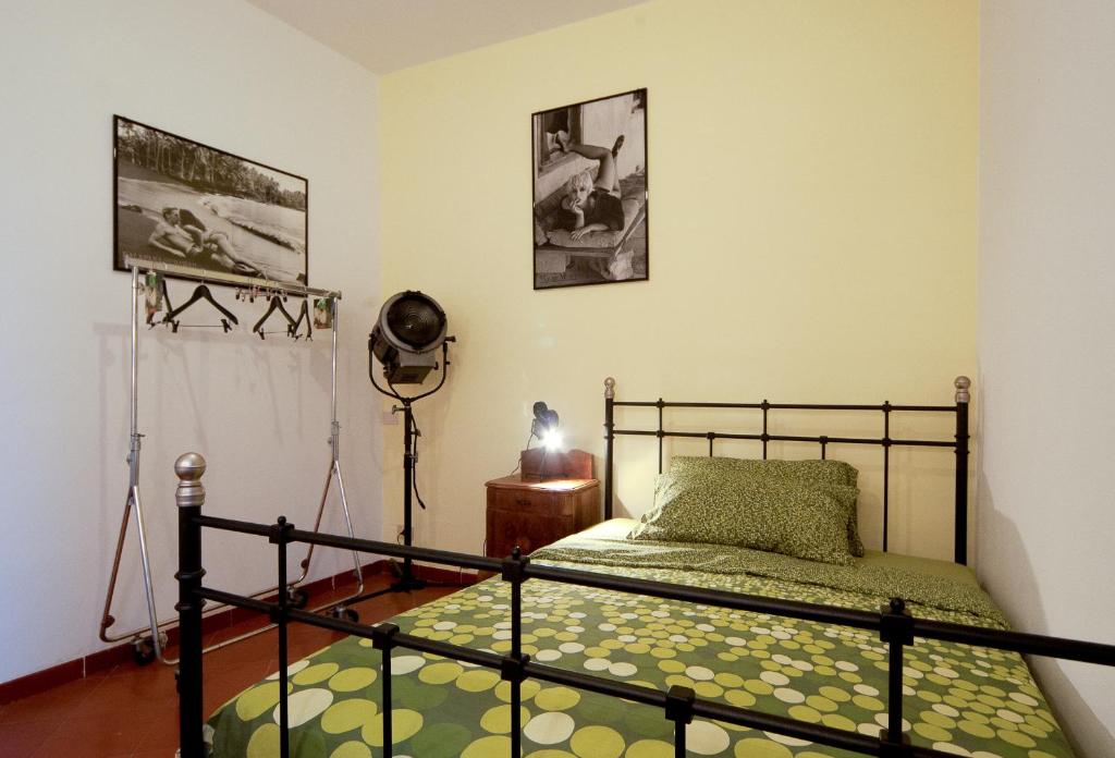 Postel nebo postele na pokoji v ubytování Light of Rome