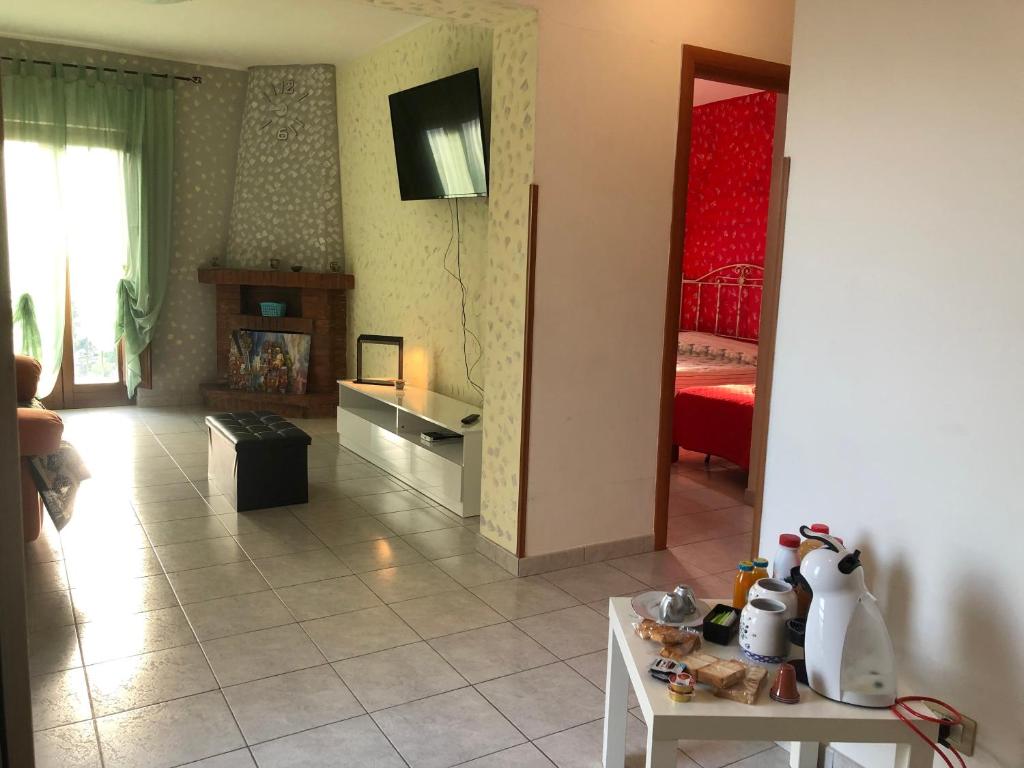 TV a/nebo společenská místnost v ubytování B&B Al Castello