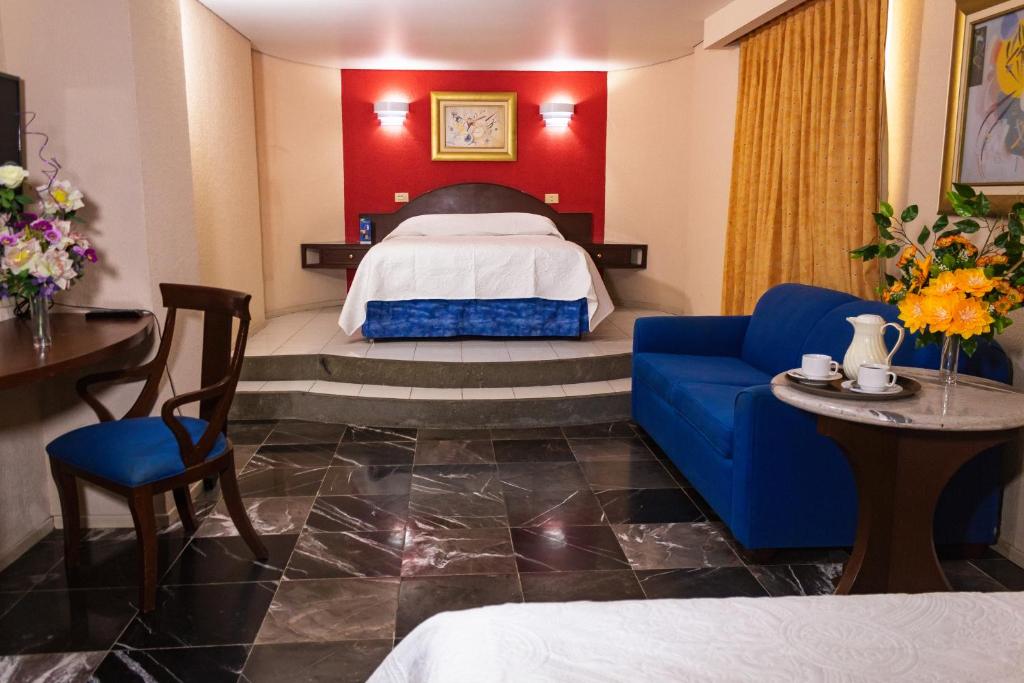 Postel nebo postele na pokoji v ubytování Hotel Tapachula
