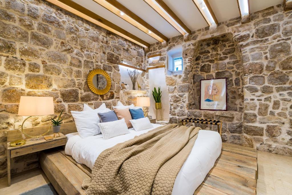 Posteľ alebo postele v izbe v ubytovaní Apartment Harmony