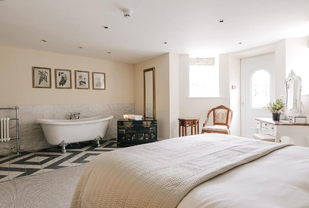 Postel nebo postele na pokoji v ubytování Tyndall Villa Boutique B&B