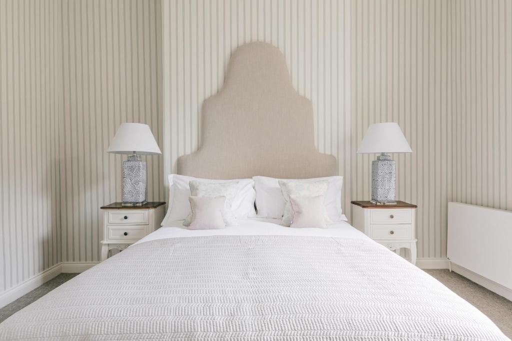 Postel nebo postele na pokoji v ubytování Tyndall Villa Boutique B&B