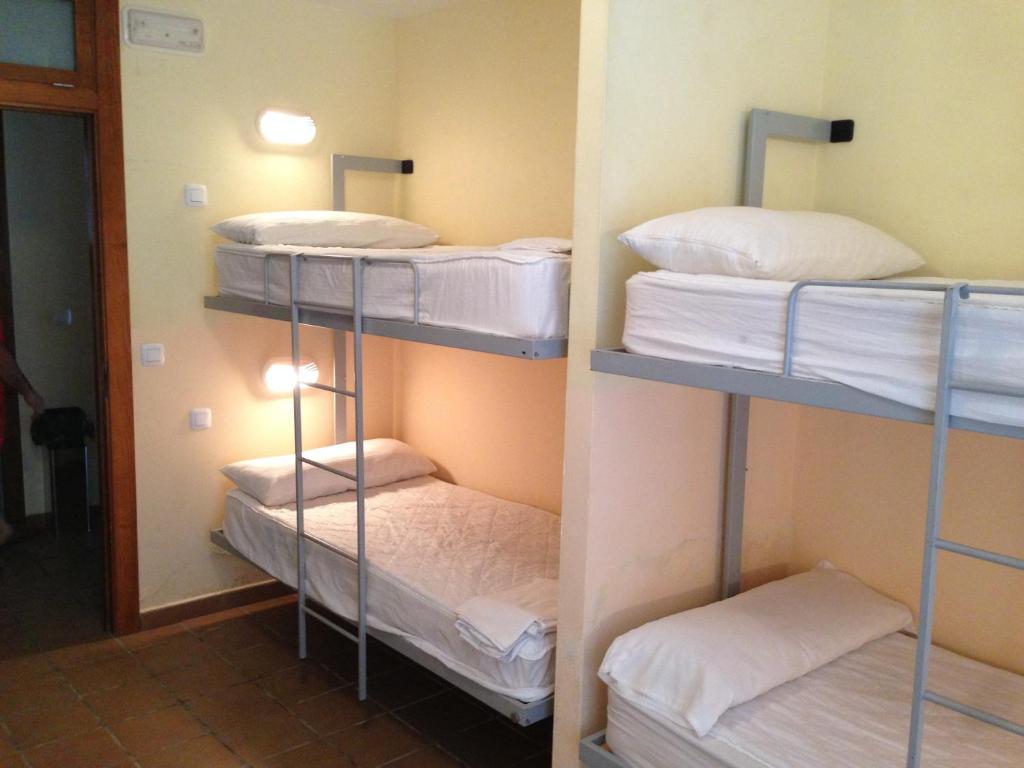Postel nebo postele na pokoji v ubytování Albergue De Puntas De Calnegre