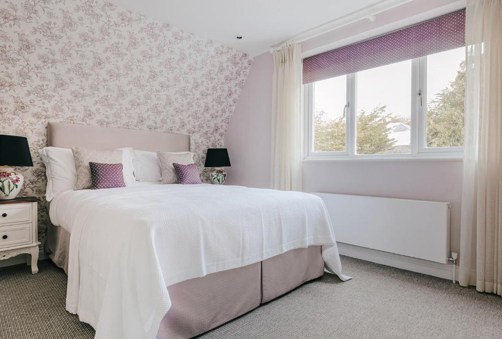 Postel nebo postele na pokoji v ubytování Tyndall Villa Boutique B&B