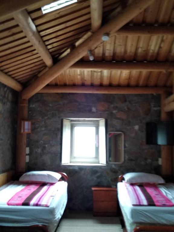 Postel nebo postele na pokoji v ubytování Chin -Be Village Cafe & Homestay