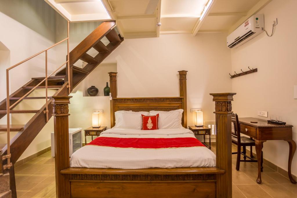 Postel nebo postele na pokoji v ubytování Lar Amorosa Boutique Hotel - Goa
