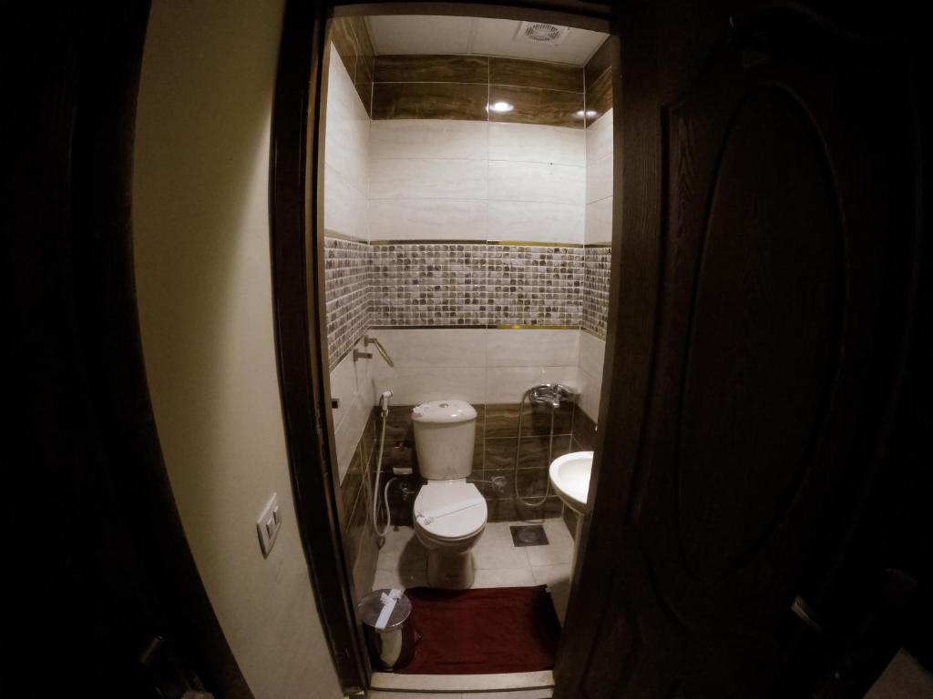 Koupelna v ubytování City Hotel