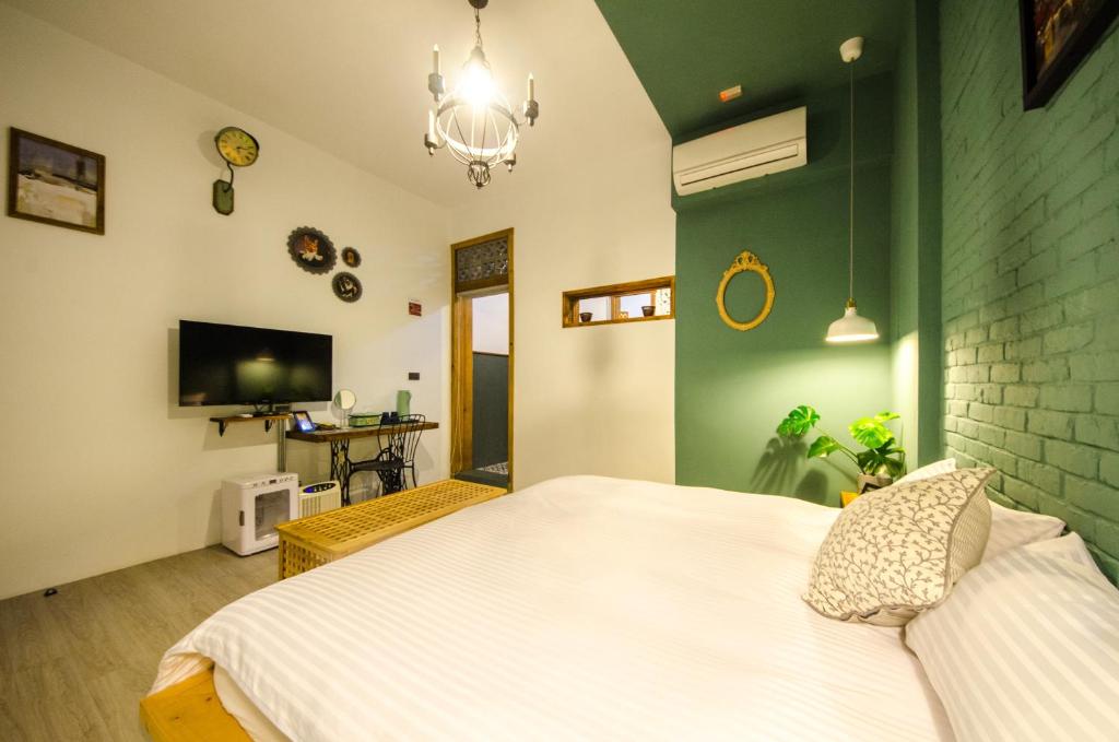 TV a/nebo společenská místnost v ubytování Sleep inn 旅宿l k歌l烤肉l麻將l調酒l國旅卡特約l可包棟