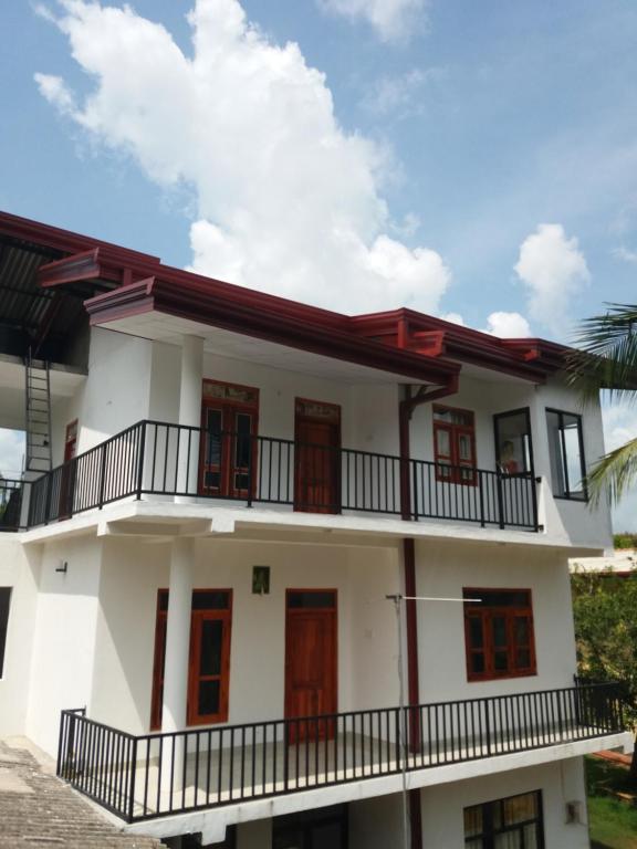 Balkón nebo terasa v ubytování Kumudu Holiday Home