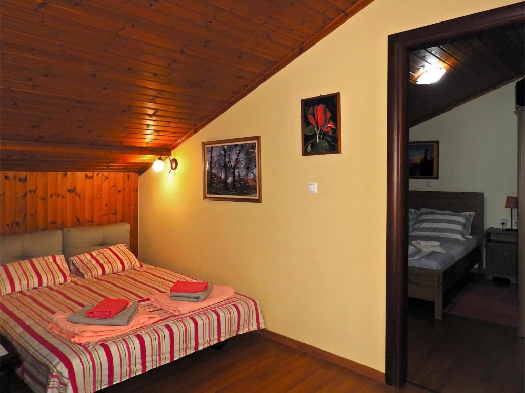 A bed or beds in a room at PanoramaLoft - quality, view, sea & mountain