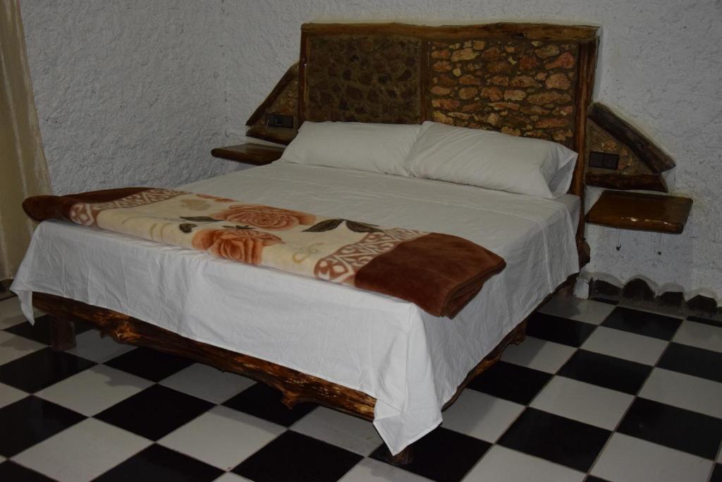 Postel nebo postele na pokoji v ubytování Hotel Leonor