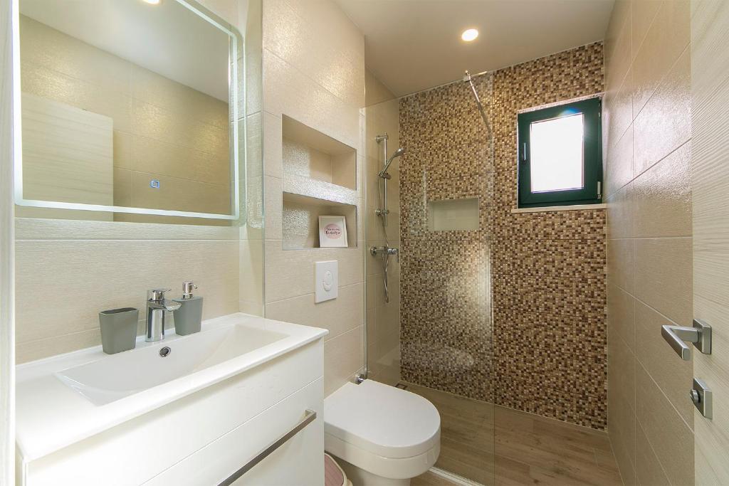 Kúpeľňa v ubytovaní Apartment Roso