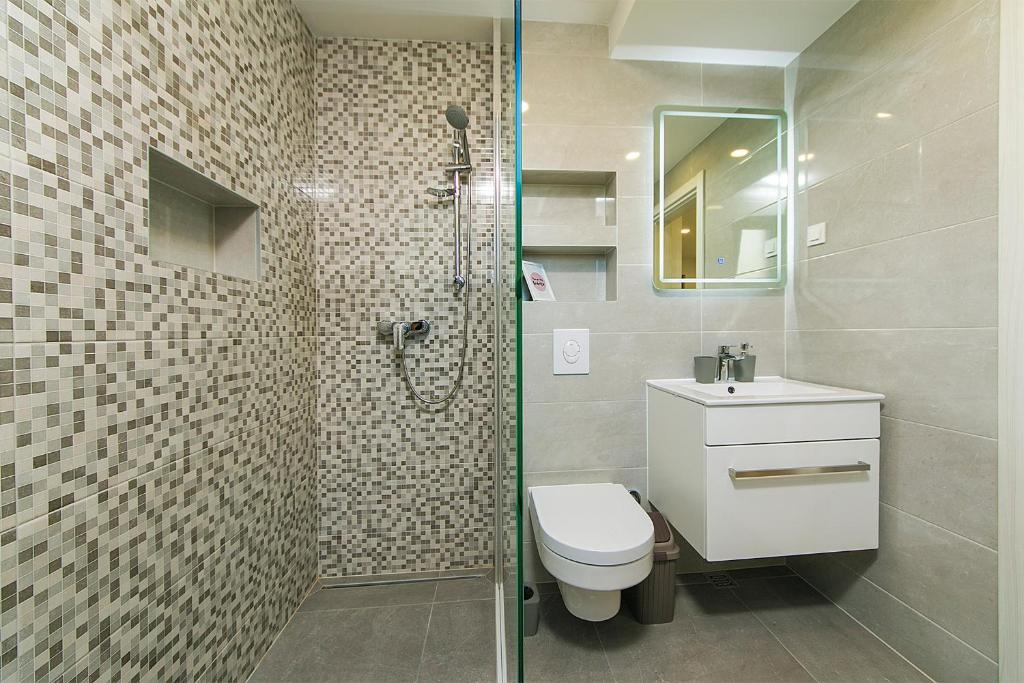 Kúpeľňa v ubytovaní Apartment Roso