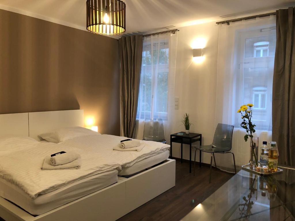 Ένα ή περισσότερα κρεβάτια σε δωμάτιο στο New Private Rooms Fuerth