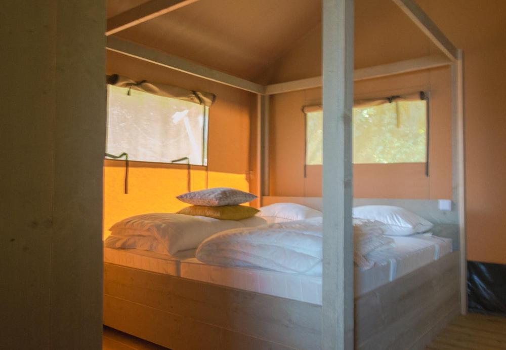 Postel nebo postele na pokoji v ubytování Camping At Sea