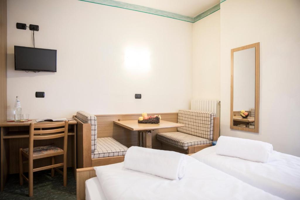 Postel nebo postele na pokoji v ubytování Active Hotel Rosat