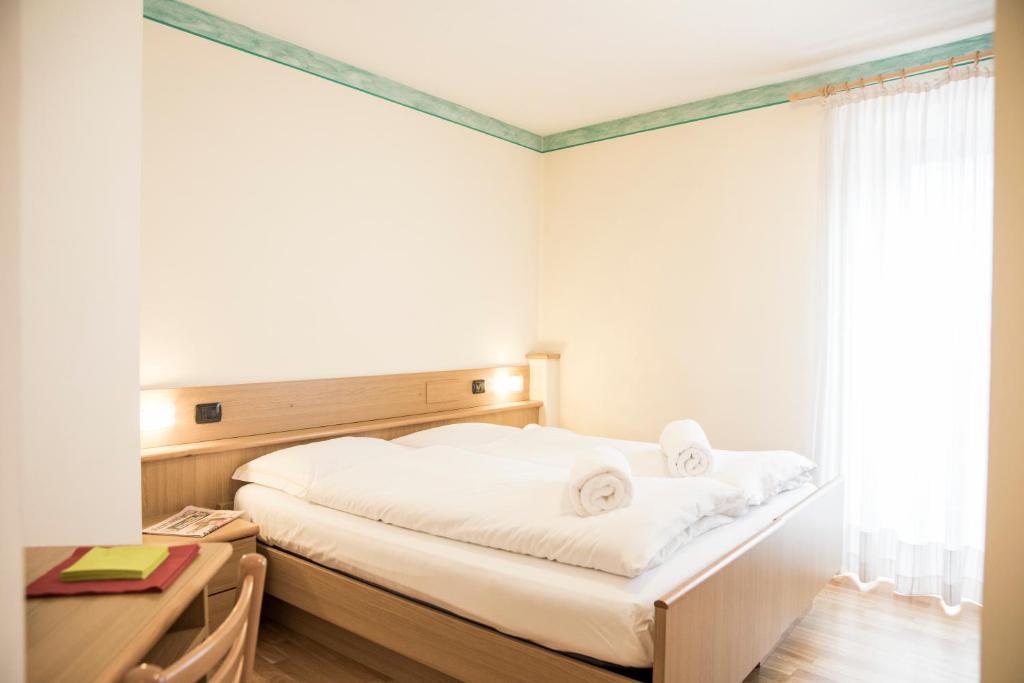 Postel nebo postele na pokoji v ubytování Active Hotel Rosat