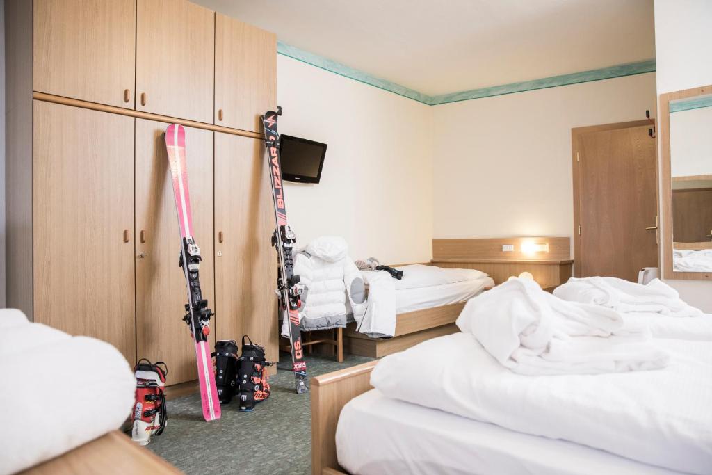 Postel nebo postele na pokoji v ubytování Active Hotel Rosat