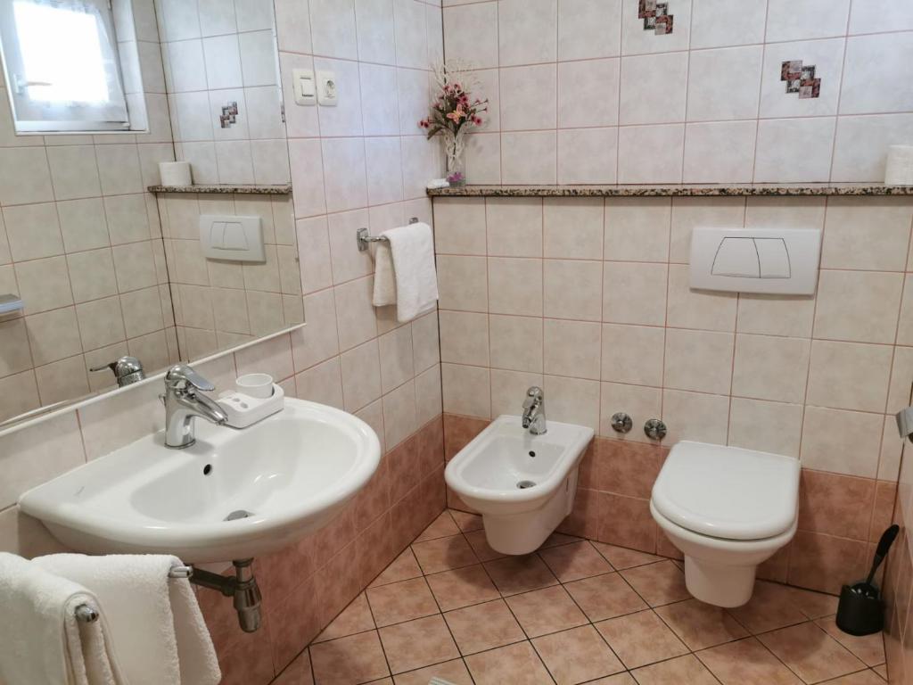 Koupelna v ubytování Apartments Ines
