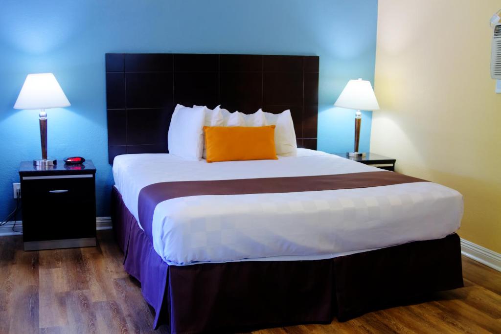 Palm Tropics Motel - Quarto King