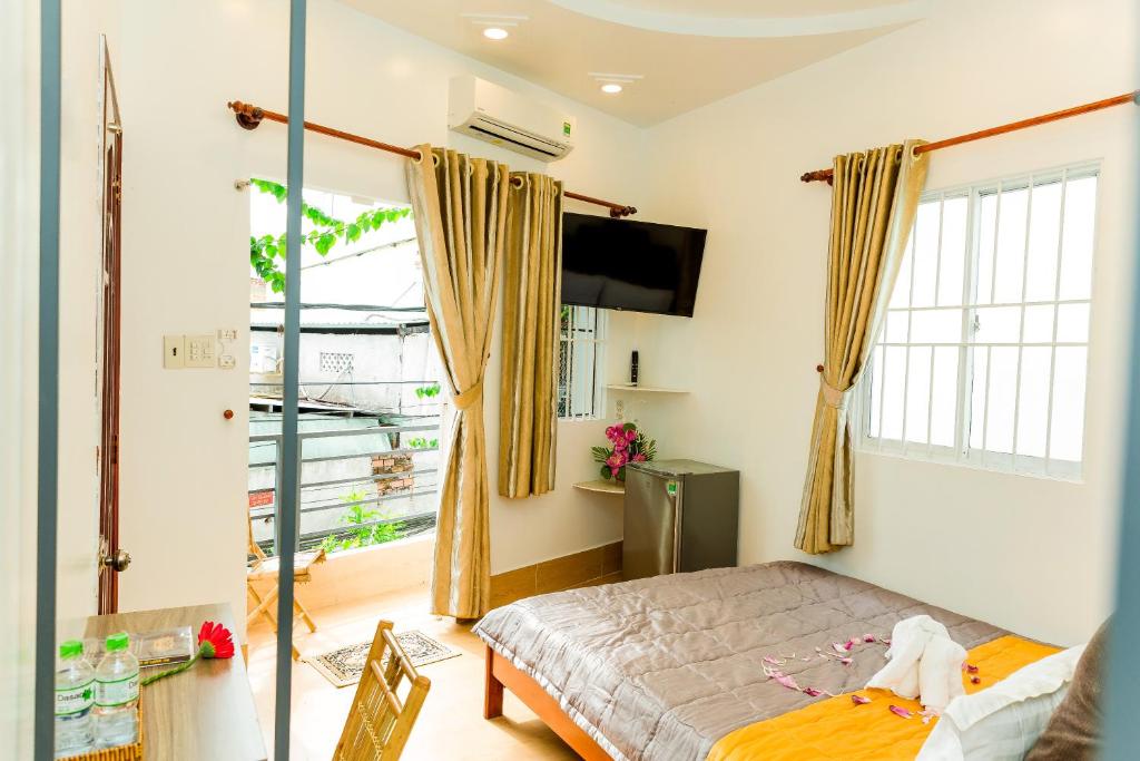 Postel nebo postele na pokoji v ubytování Buddha Homestay