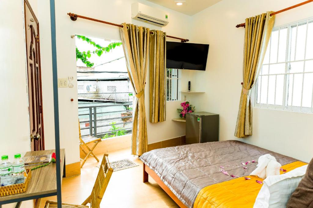 Postel nebo postele na pokoji v ubytování Buddha Homestay
