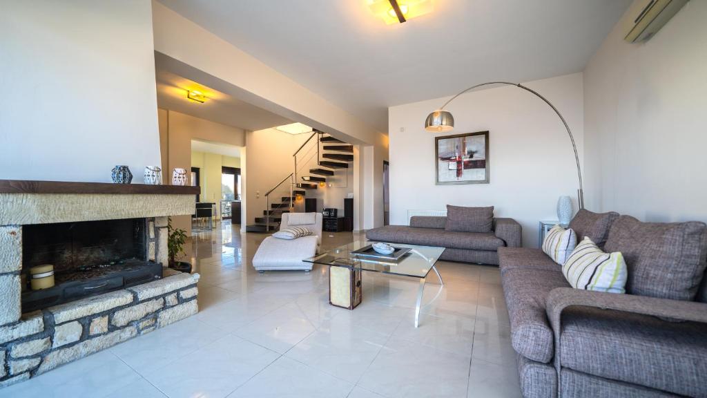 Posezení v ubytování Villa Majestic Crete heated pool and sauna