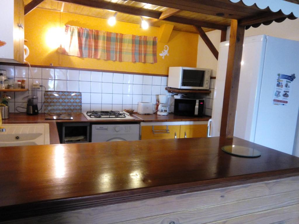 Kuchyň nebo kuchyňský kout v ubytování La Villa Jasmin