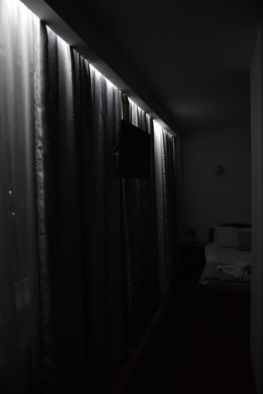 Postel nebo postele na pokoji v ubytování Hotel Magurele