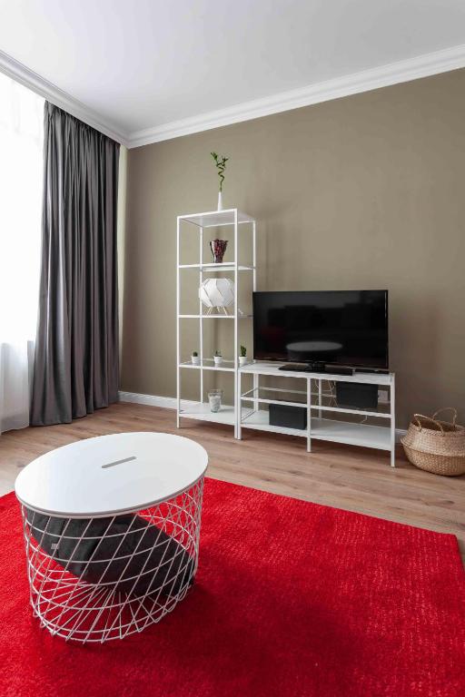 TV a/nebo společenská místnost v ubytování Martin Boutique Hotel