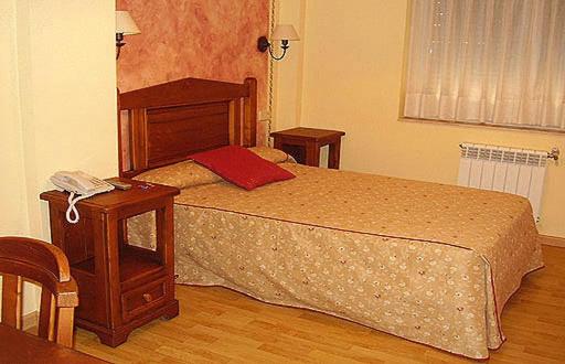 Postel nebo postele na pokoji v ubytování La Becera