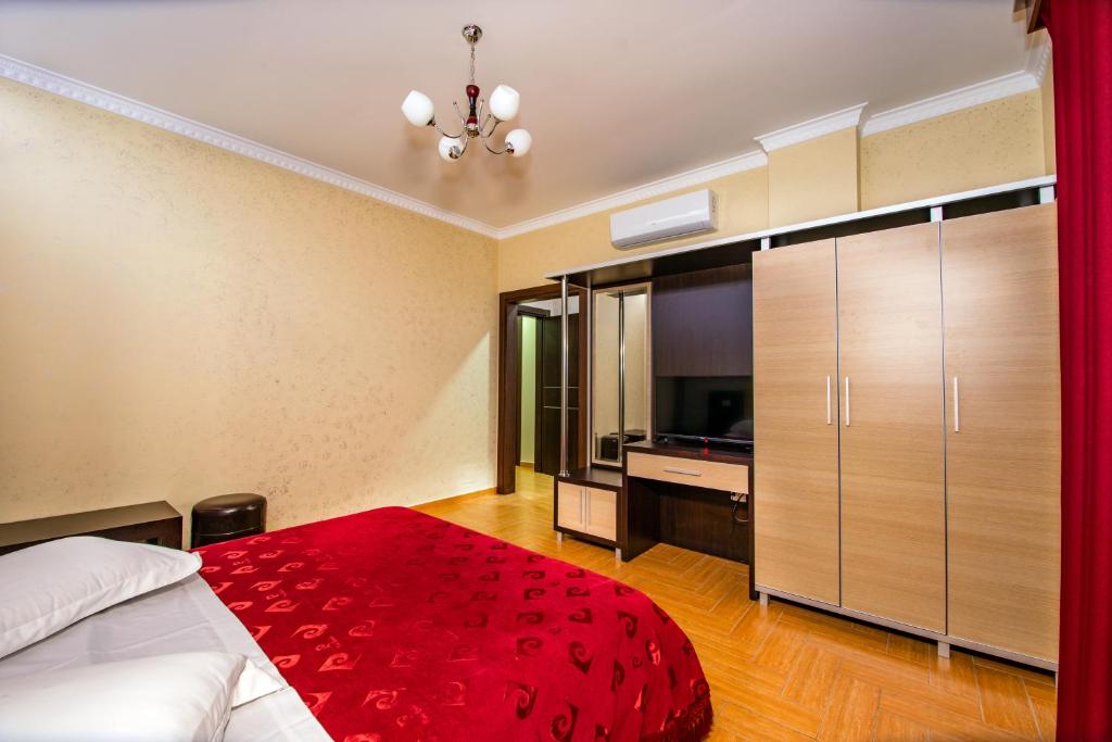 Postel nebo postele na pokoji v ubytování Fieri International Hotel