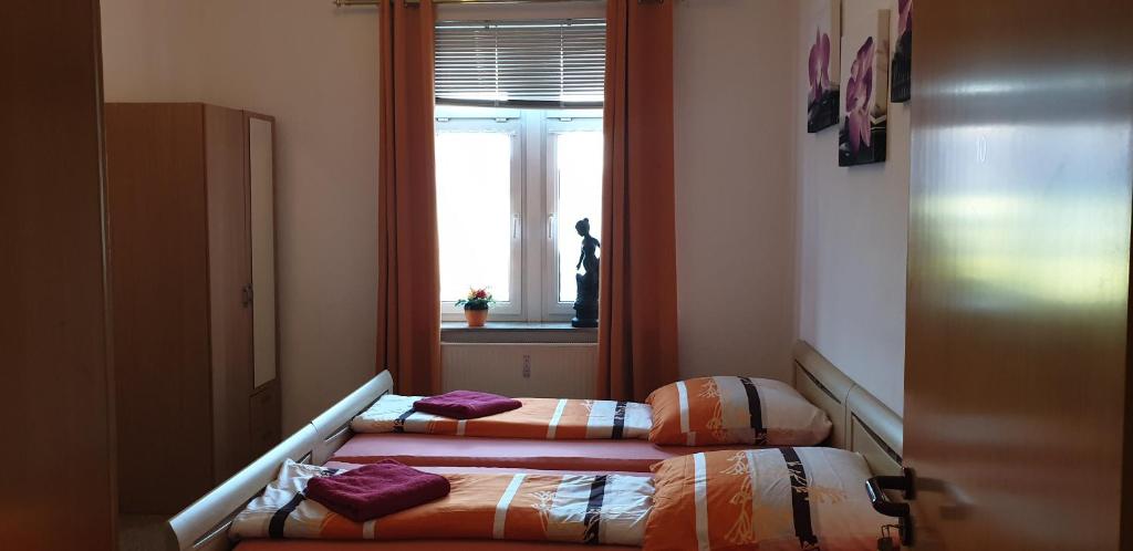 Postel nebo postele na pokoji v ubytování Gasthaus Pavillon